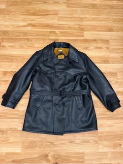 Vintage 1970s Amerex Fine Outerwear double-breasted trench coat in classic black faux leather / vinyl. Made in Japan.