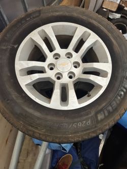 18 inch set of Silverado rims and almost new tires