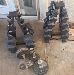 Full dumbell set with 2 stands. 5 through 35 pounds and 3 adjustable dumbbells with brnch