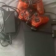 I Am Selling A PS2 Slim With Two Controllers