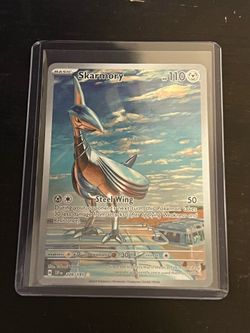Skarmory - Holo SV8 Surging Sparks 209/191 NM Pokemon