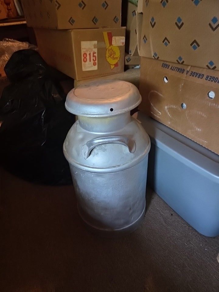 Antique Milk Container.