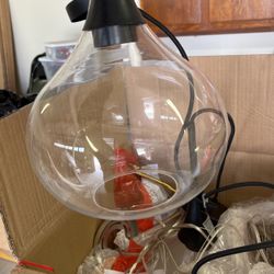 2 Glass And Flat Black Pendant Lights