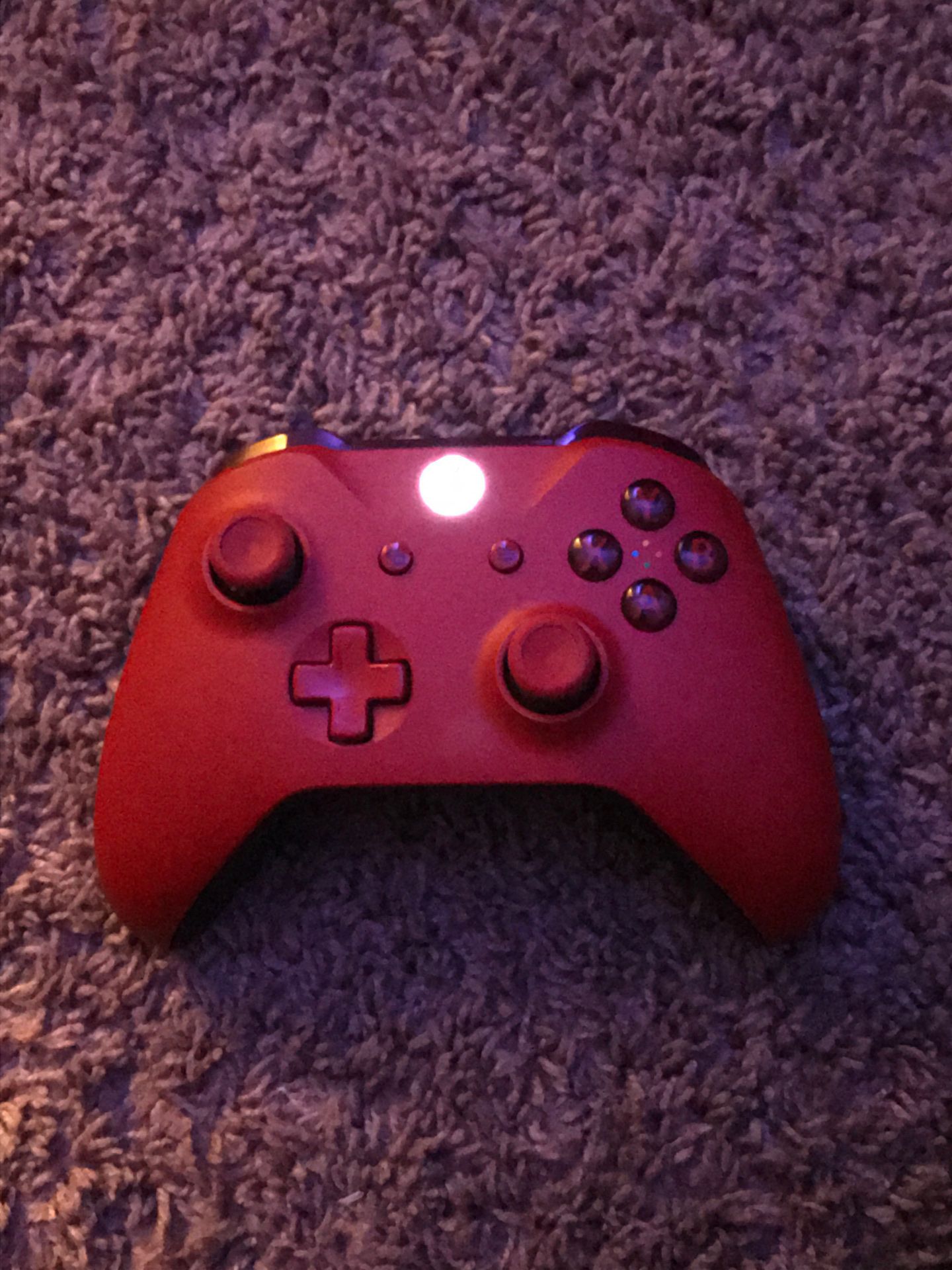 Reddish Xbox controller