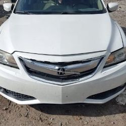 2014 Acura ILX with 138k miles.