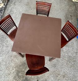 Wooded Counter Height Dining Table With Four Ladder-back Chairs