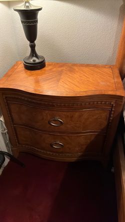 California king bed and two nightstands