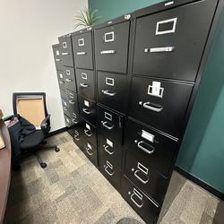 4 tall black filing cabinets