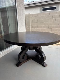 Round Dark Wood Pedestal Dining Table