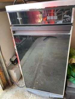 Trash compactor . Whirlpool