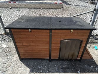 Large wooden dog house