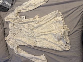 Cream romper size smal with tags