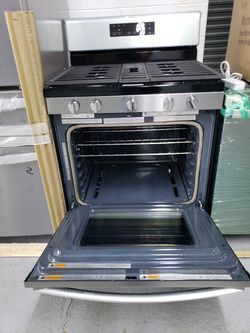whirlpool set stove and 4 doors fridge new open box warranty