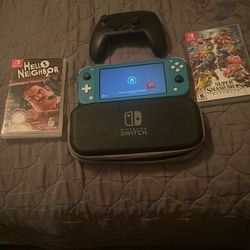 Nintendo Switch Lite With Case, Two Games, A Controller, A Micro Sd Card, And Charger