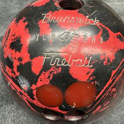 Vintage Bowling Ball, Brunswick Fireball, MCM Atomic Black & Red. 4” between finger & thumb. 16lbs