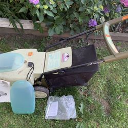 neuton cordless electric mower with grass bagger model em5.1 It's Missing battery & Charger Mower costed $379 has owner manual & New extra plastic bat