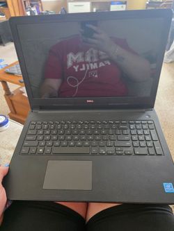 Dell Inspiron 15 3552 laptop and bag