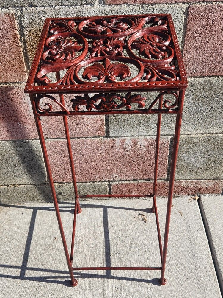 Wrought iron plant 28 in H and 11 in W (Location In Description)