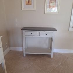 Creamy Light Beige/Grey Color 2 Drawer lightly Distressed from factory Table  With Shelf. 