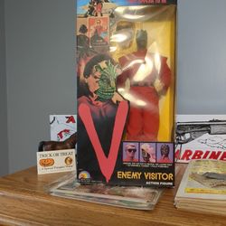 Enemy Visitor Action Figure $100