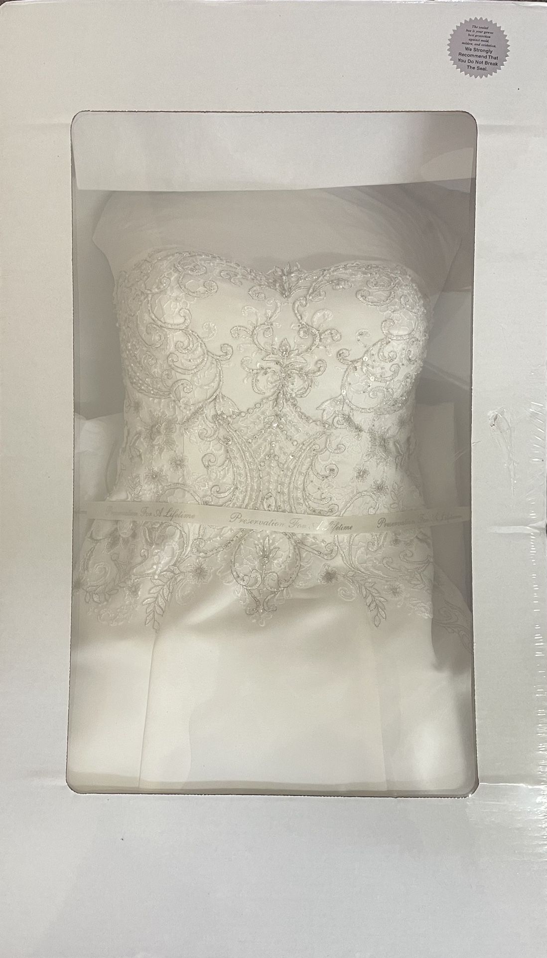 Wedding Dress Reconditioned In New Packaging