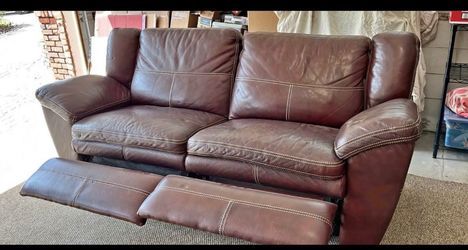 Leather reclining sofa in good shape
