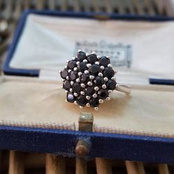 925 vintage cluster ring with black sapphires like a purplish deep garnet almost black gems