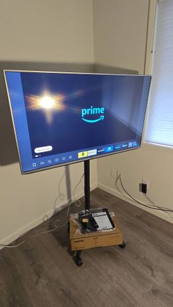 49in. LG Full HD TV w/ firestick on Mobile Stand