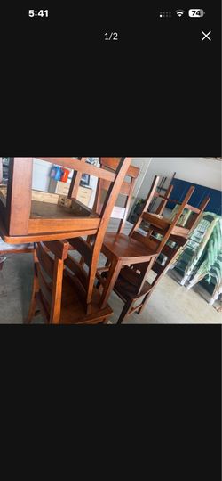 Dining table and set of chairs