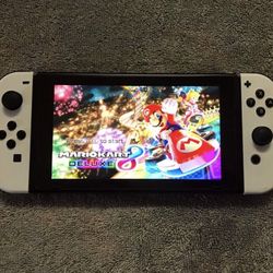 NINTENDO SWITCH With 125 SWITCH GAMES 