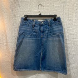 Blue denim midi skirt with a low front slit