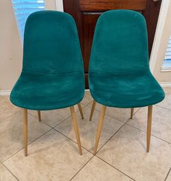 Green velvet chairs