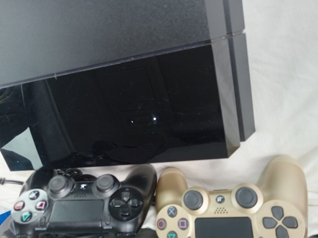 PS4 model CUH-1001A with 2 remotes. tested works great