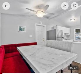 Modern Faux Marble Table with Banquette Seating