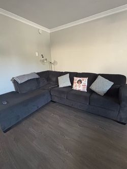 Gray, two piece , couch bed sectional
