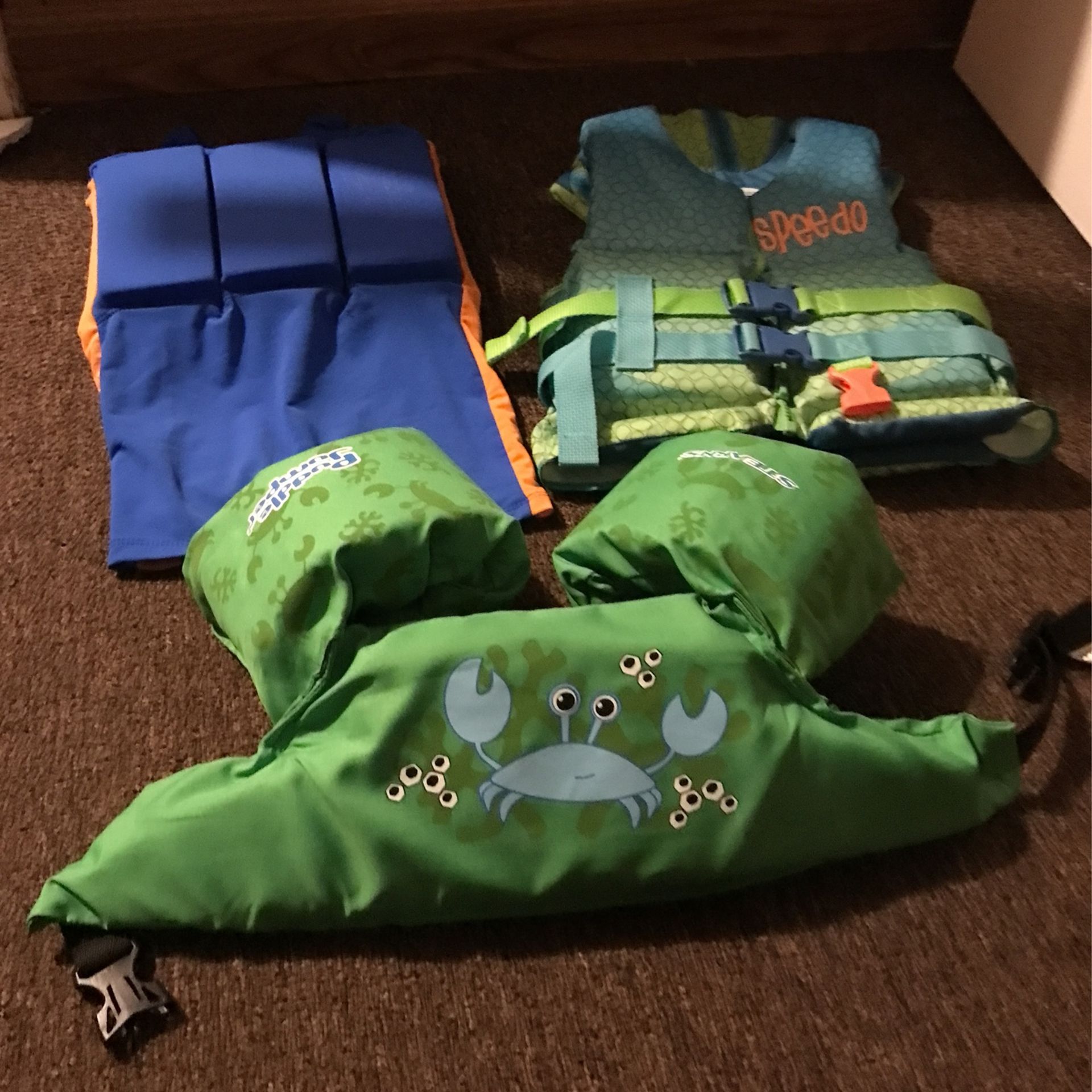 Bundle of 3 life jackets Sizes 30-50lbs
