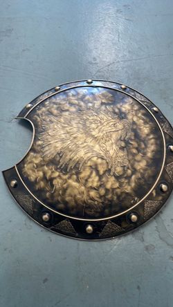 Decorative Metal Shield with Wolf Engraving