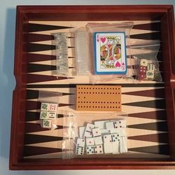NEVER USED MULTI GAME SET UP, CHECKERS , CARDS, DICE, DOMINOES, ETC.. - $10 (Harahan)