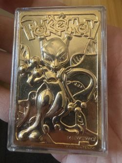 official 23-karat gold-plated Mewtwo card (#150) from the 1999 Burger King Pokémon promotion.
