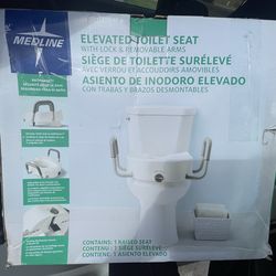 Raised toilet seat