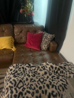Brown L shaped couch