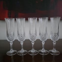 Cristal d'Arques - Set of five crystal champagne flutes in the 'Longchamp' pattern by Cristal d'Arques