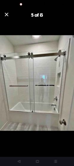 Frameless bathtub shower door 60x66 open box chrome original price is $450 sale $250