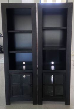 2 towers part of an entertainment center