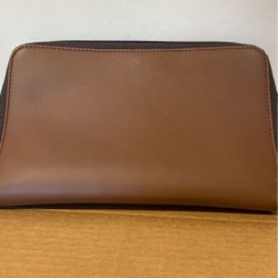 Authentic COACH light brown leather recharging case