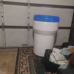 Plastic Barrel Has Locking Lid I Believe It's 45 Gal