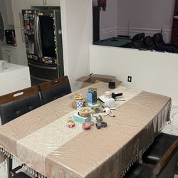 Almost New dining table With Storage 
