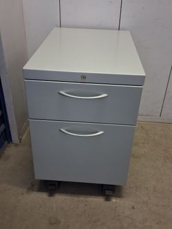 Metal file cabinet  With key $ 60 reach