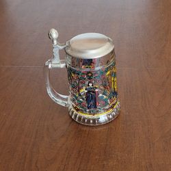 Vintage West Germany Rein Zinn BMF Pewter Lid Glass Beer Stein Medieval 
Scene.

5.5 inches tall plus lid. Weight 1lb 15oz plus shipping materials.
Pr