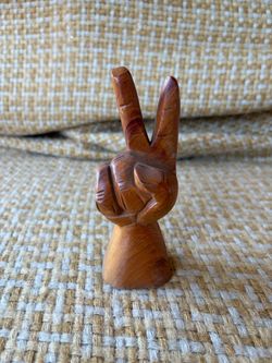Vintage hand carved wood hand sculpture with peace sign